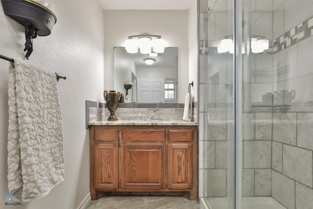 bathroom with vanity and an enclosed shower