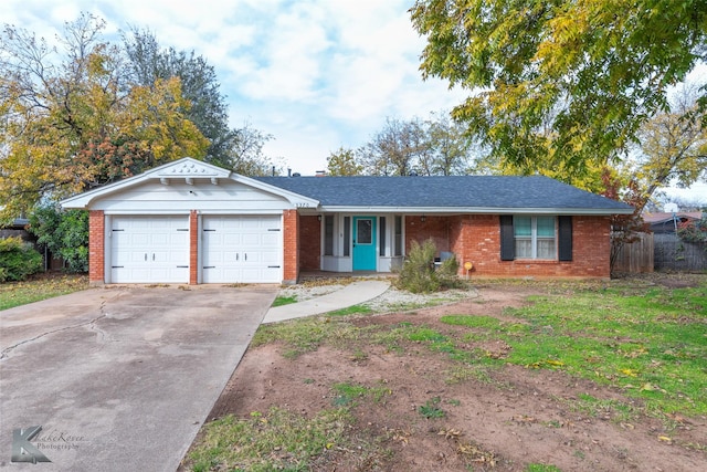 ranch-style house featuring a garage