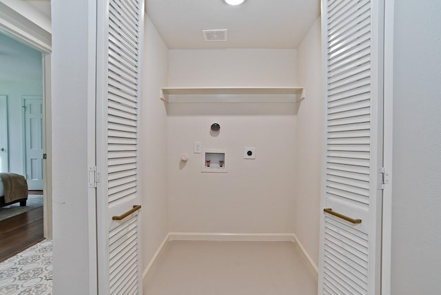 laundry area featuring gas dryer hookup, washer hookup, light wood-type flooring, and hookup for an electric dryer