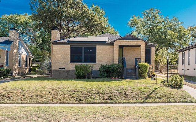 view of front facade with a front yard