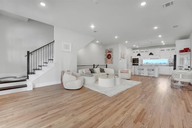 living room featuring light wood-type flooring