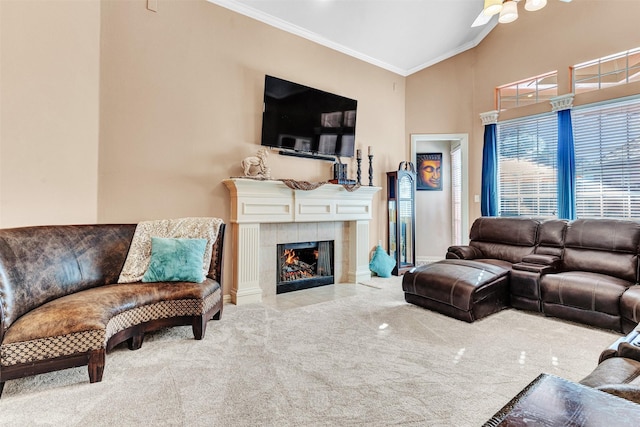 carpeted living room featuring a fireplace and ornamental molding