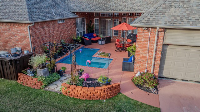 view of pool featuring outdoor lounge area and a patio area