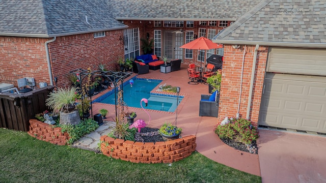 view of swimming pool featuring outdoor lounge area and a patio area