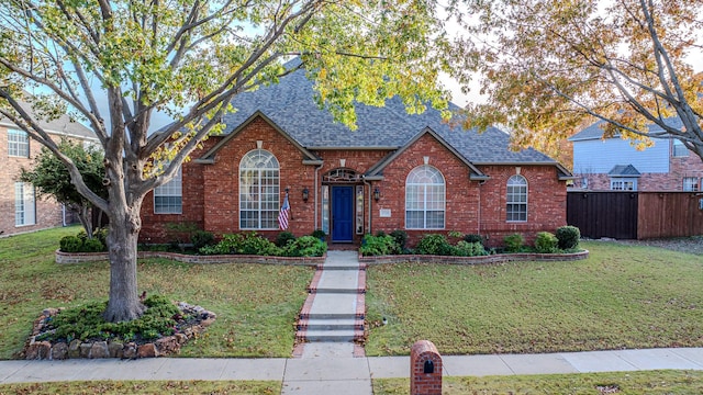 view of front facade with a front lawn