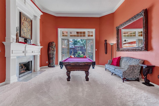 game room with crown molding, a fireplace, light colored carpet, and billiards