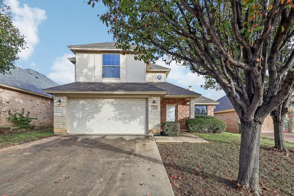 view of property featuring a garage