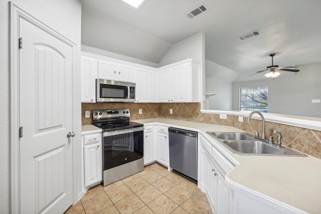 kitchen featuring white cabinetry, sink, and stainless steel appliances