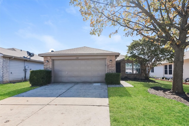 ranch-style home featuring a garage and a front yard