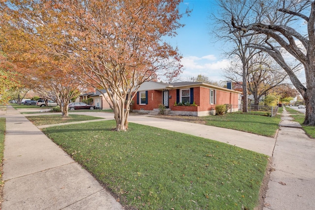 view of front facade with a front lawn