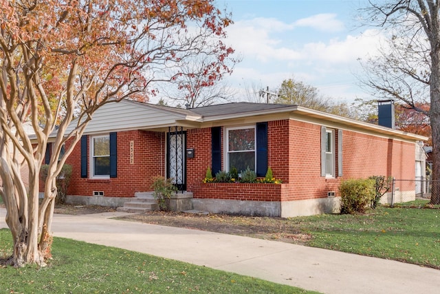 single story home with a front yard