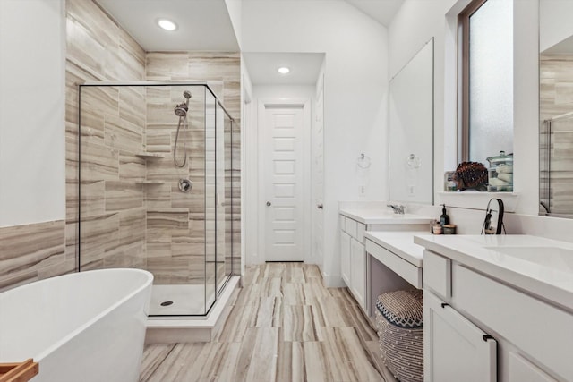 bathroom with vanity and plus walk in shower