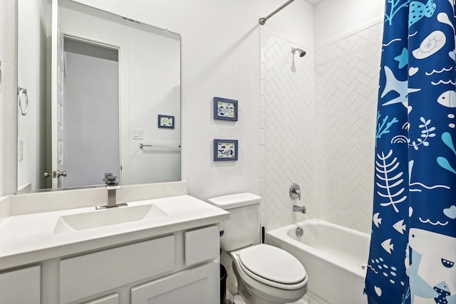 full bathroom with vanity, shower / bath combination with curtain, and toilet