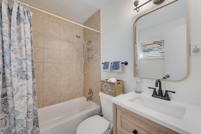 full bathroom with a textured ceiling, vanity, shower / bath combo, and toilet