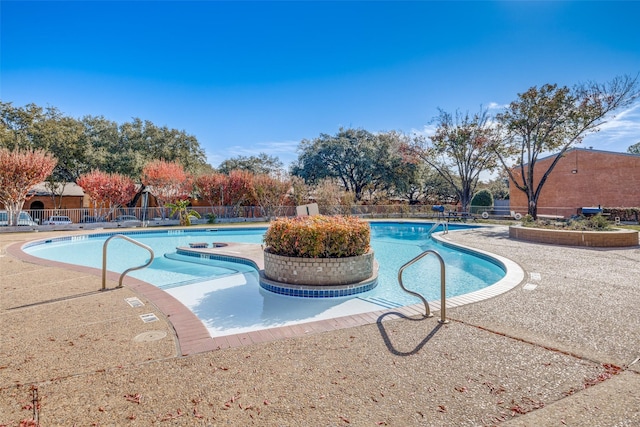 view of pool featuring a patio