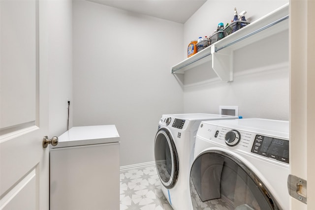 clothes washing area with independent washer and dryer