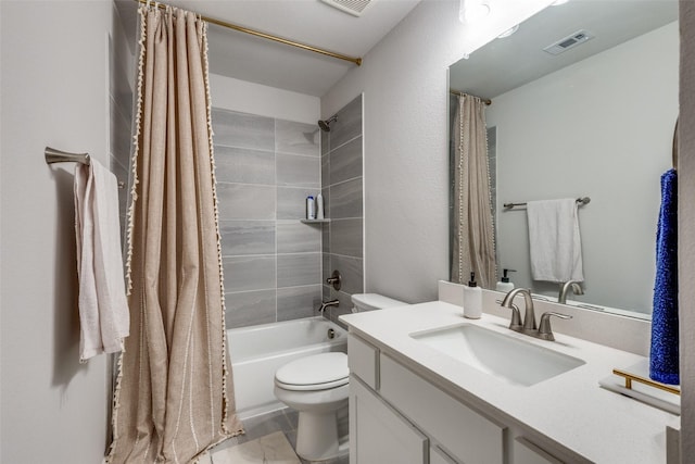 full bathroom with shower / bath combo, vanity, and toilet