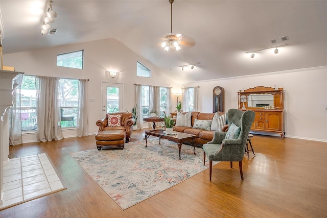 living room with ceiling fan, high vaulted ceiling, track lighting, and light wood-type flooring