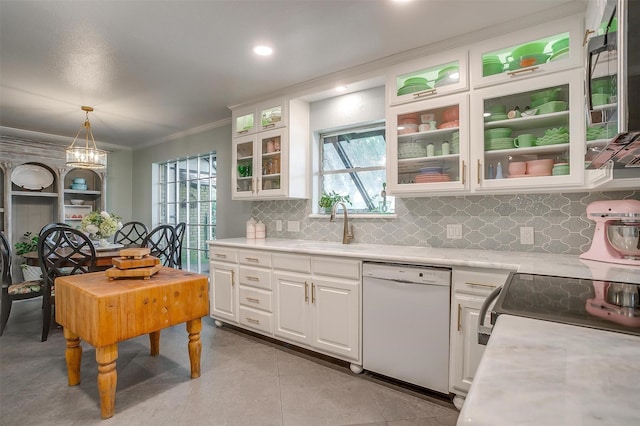 kitchen featuring decorative light fixtures, white cabinetry, sink, ornamental molding, and white dishwasher