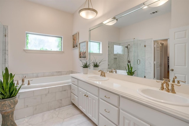 512 N Parkridge Dr, Mansfield, TX 76063 - full bathroom featuring plenty of natural light, double vanity, a shower stall, and a bath