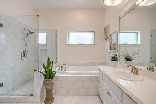 bathroom featuring vanity and plus walk in shower