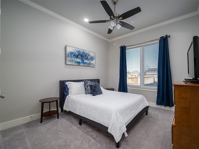 bedroom with light colored carpet, ceiling fan, and crown molding