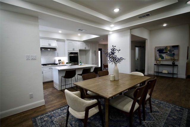 unfurnished living room featuring ceiling fan, a fireplace, and dark hardwood / wood-style floors