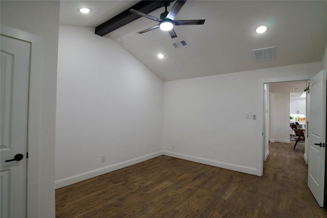 empty room featuring vaulted ceiling with beams, ceiling fan, and dark wood-type flooring