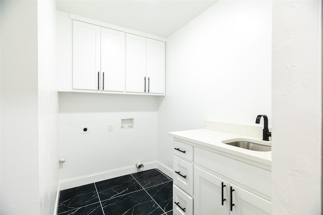 clothes washing area with washer hookup, sink, cabinets, and hookup for an electric dryer