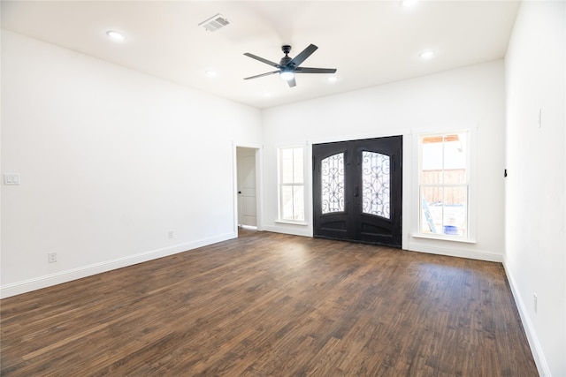 foyer featuring ceiling fan, french doors, and dark wood-type flooring