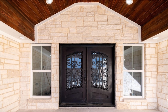 property entrance featuring french doors