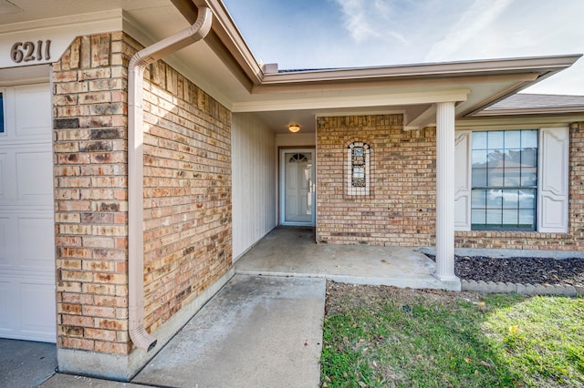 entrance to property featuring a garage