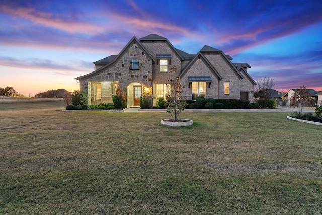 view of front of home featuring a yard