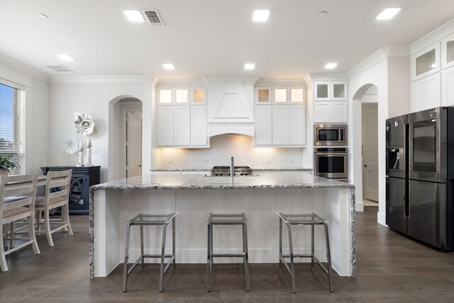 living room featuring coffered ceiling, ceiling fan, dark hardwood / wood-style flooring, and beam ceiling