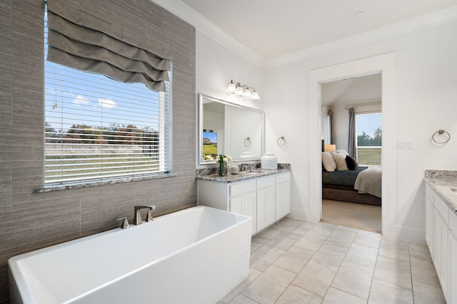 bathroom with tile patterned floors, vanity, and shower with separate bathtub