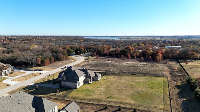 birds eye view of property with a rural view