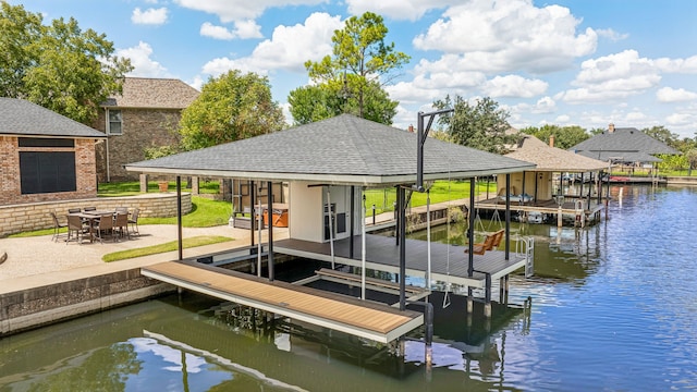 dock area featuring a water view