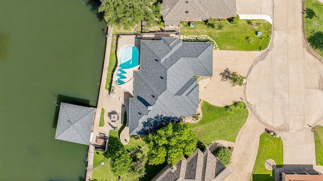 drone / aerial view with a water view