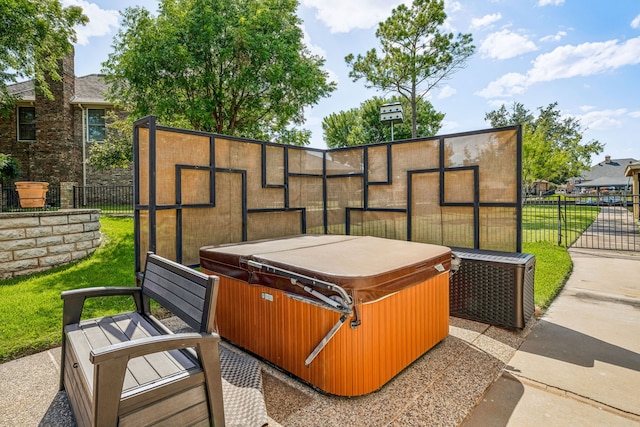 view of patio with a hot tub