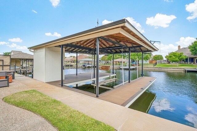 dock area featuring a water view