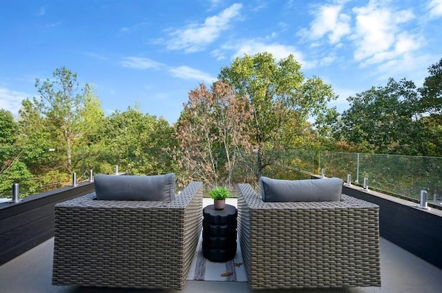 view of patio / terrace with a balcony