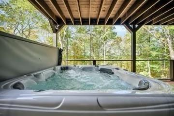 view of patio featuring a hot tub