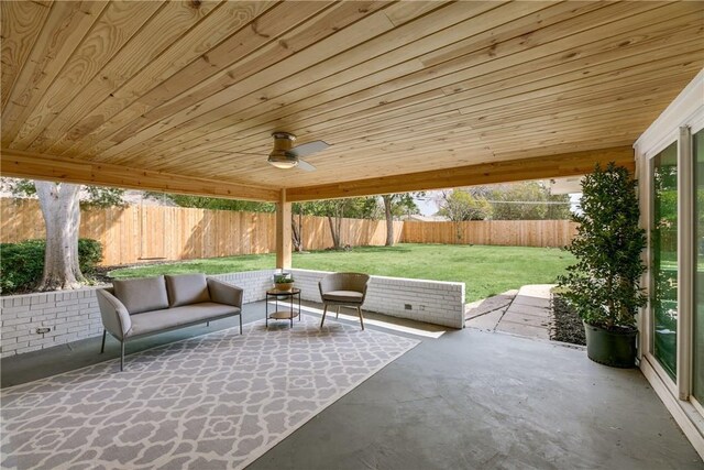 view of patio featuring ceiling fan and an outdoor living space