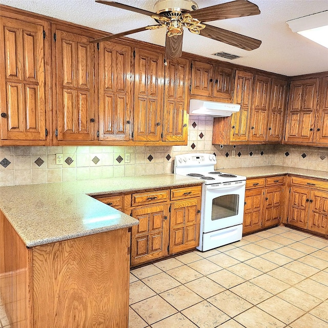 kitchen featuring light tile patterned floors, electric range, ceiling fan, and backsplash