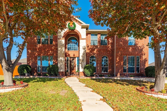 view of front of home featuring a front yard