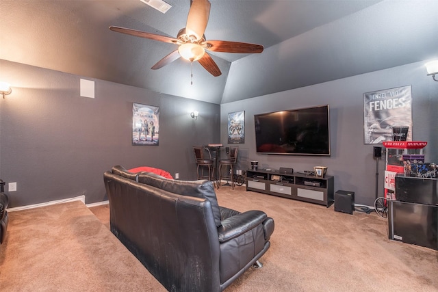 carpeted cinema featuring ceiling fan and lofted ceiling