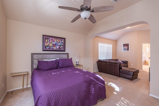 bedroom featuring ceiling fan, lofted ceiling, and light carpet