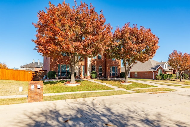 view of front of home with a front lawn