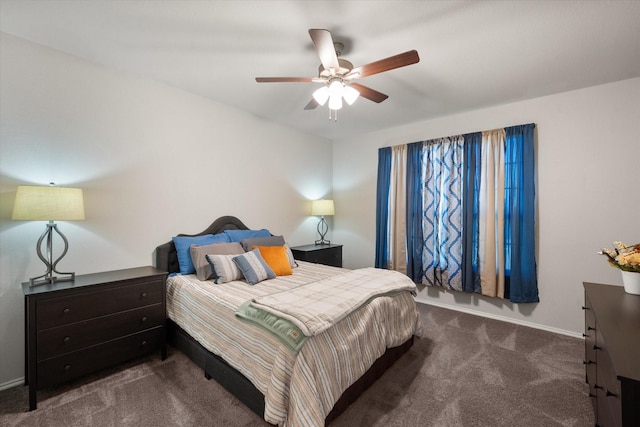 carpeted bedroom featuring a ceiling fan and baseboards