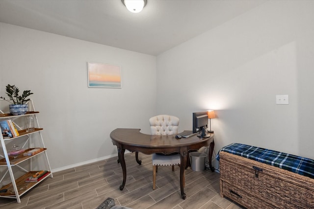 office space featuring wood tiled floor and baseboards